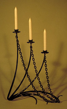 sculptural candlestick with chains