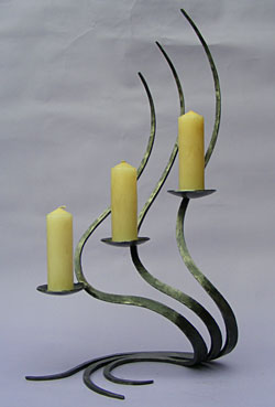 candlestick in forged metal made by blacksmith Paul Margetts