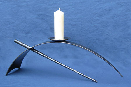 sculptural candle holder in metal