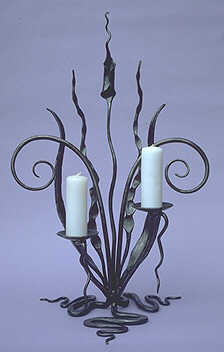 candlestick with an organic theme, a candleholder with a floral design